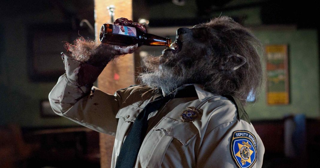 Lowell Dean. WolfCop (Leo Fafard) chugs a beer in this still from the upcoming Lowell Dean film WolfCop.