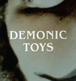 1992's Demonic Toys was written by the same guy who wrote 2008's The Dark Knight ... no really.