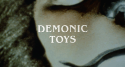 1992's Demonic Toys was written by the same guy who wrote 2008's The Dark Knight ... no really.